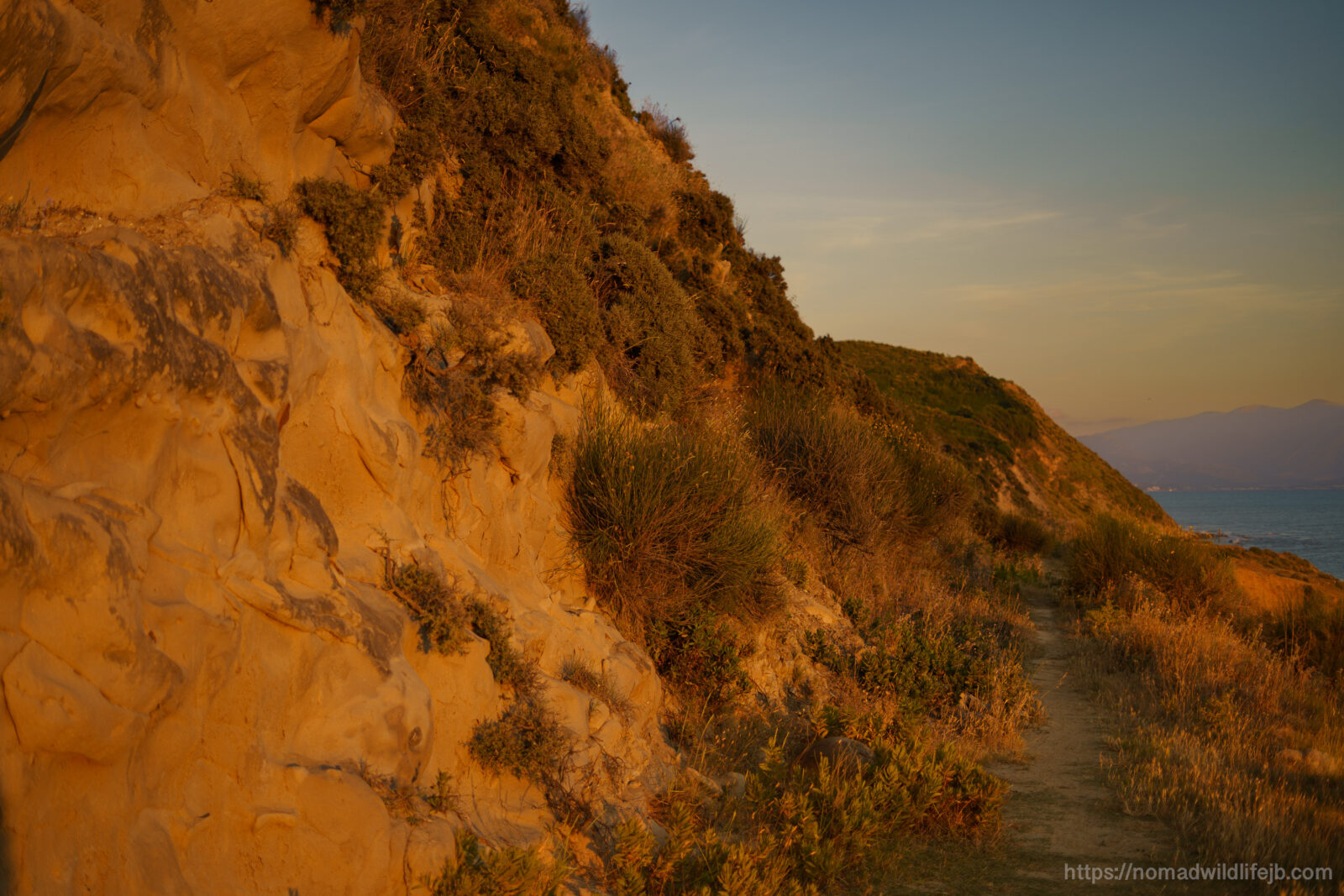 Limestone coastal trail leading toward Sazan Island in the Vjosa-Narta Protected Area, Albania.